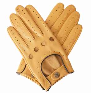 Dents Delta Driving Glove in Cork with Black Trim. Cut-outs for knuckles and back of hand. Fastens with poppered wrist strap.