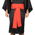 Front view of a model wearing rising dragon kimono with a red obi belt