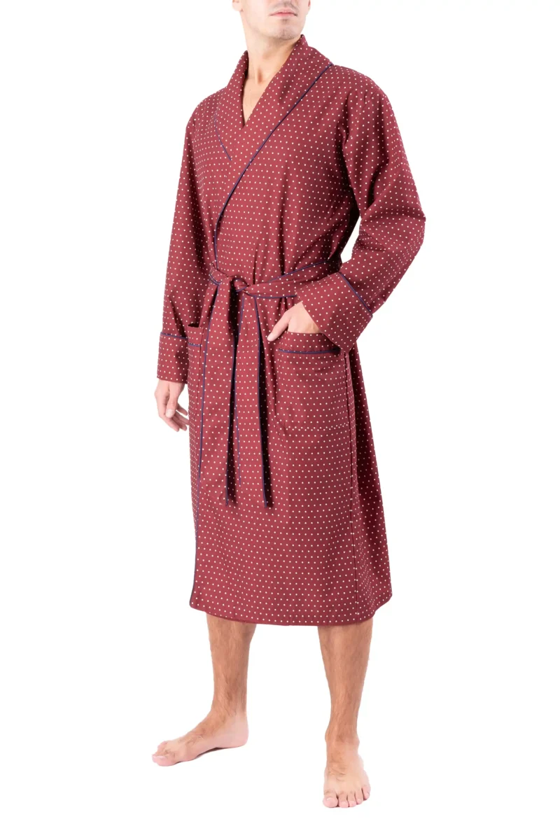 Front view of model wearing tom dick and harry burgundy polka dot dressing gown