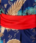Red obi belt detail on a gold dragon and eagle navy yukata kimono
