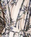 Close up detail of belt and fabic on cream bamboo and sparrow kimono
