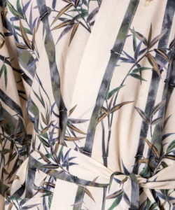 Close up detail of belt and fabic on cream bamboo and sparrow kimono
