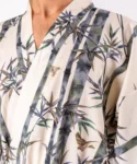Close up detail of the lapel fabric on cream bamboo and sparrow kimono