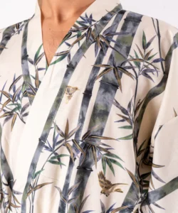 Close up detail of the lapel fabric on cream bamboo and sparrow kimono