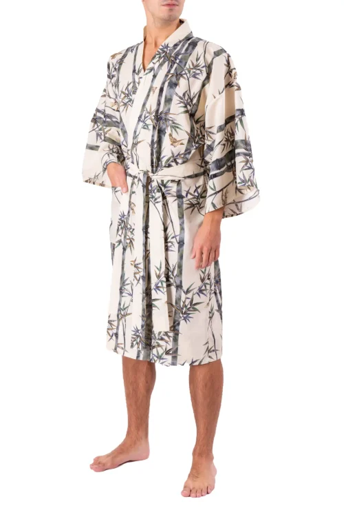 Font view of model wearing cream bamboo and sparrow kimono, showing pocket