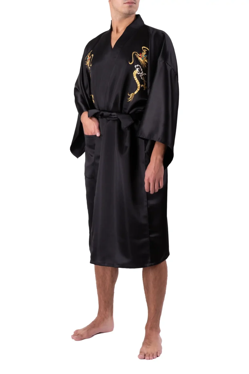 Front view of model wearing a rising dragon black kimono