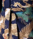 Fabric detail shot of navy and gold dragon and eagle kimono