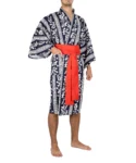 Frontview of model wearing navy autumn moon happi kimono with red obi belt