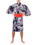Straight on view of model wearing a red obi belt with a navy carp happi Japanese kimono