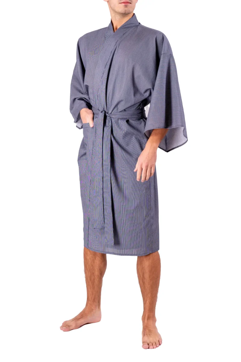 Front view of a model wearing a navy fine stripe male happi kimono