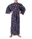 Straight on front view of model wearing a navy hannya sutra men's yukata kimono