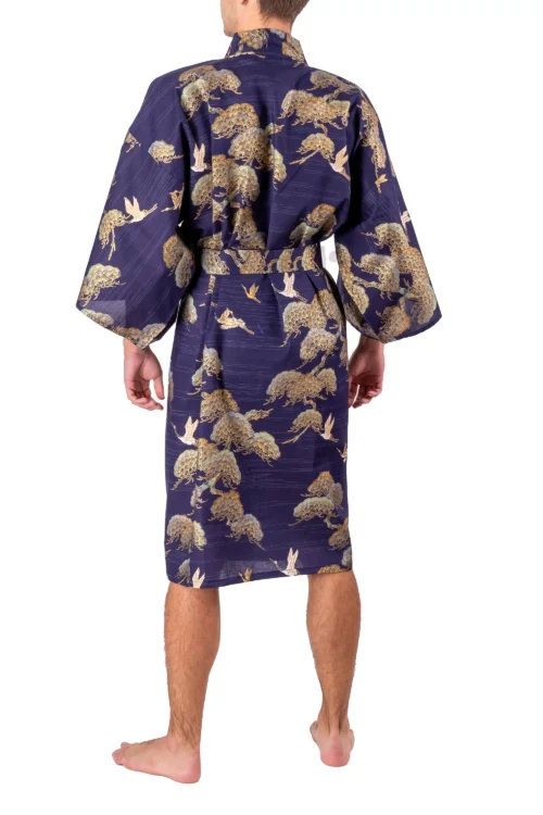 Back view of model wearing a navy pine and crane men's happi kimono