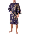 Front view of model wearing a navy pine and crane men's happi kimono