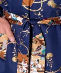 Fabric detail of model wearing navy samurai warrior happi kimono