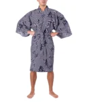 Front view of model wearing white and navy four seasons polka dot kimono