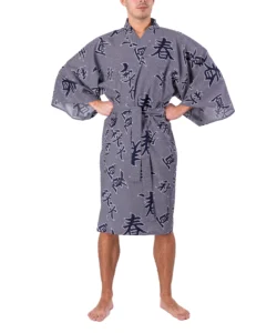 Front view of model wearing white and navy four seasons polka dot kimono